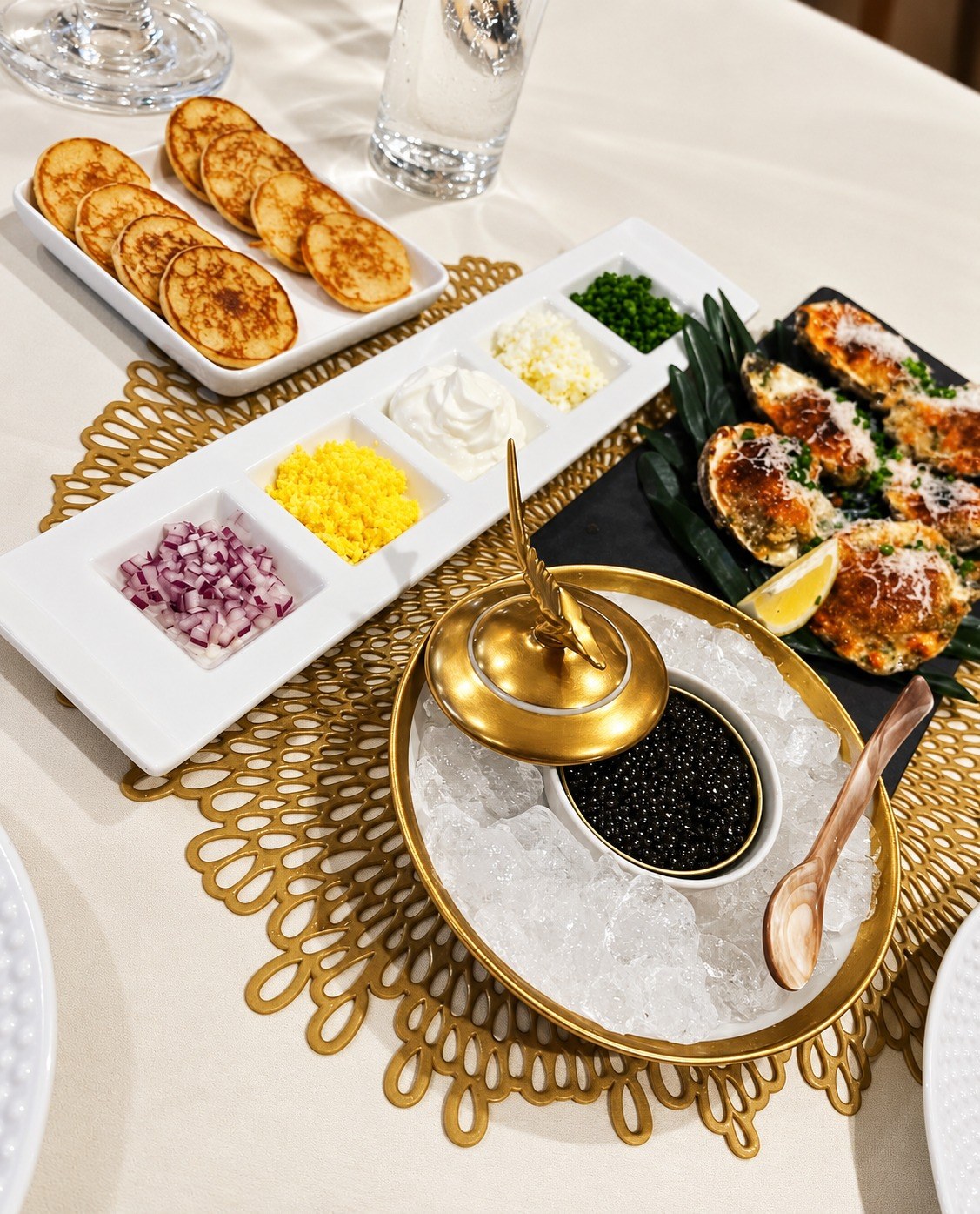 An elegant private dining table with caviar service