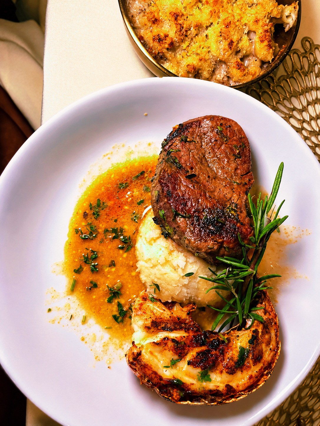CLASS surf and turf served with seafood and golden sauce